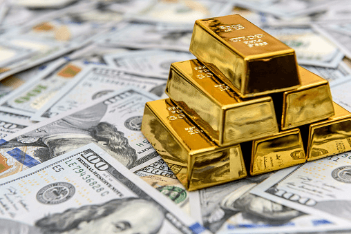 Gold declines but in a tight range